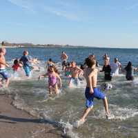 <p>Participants hit the 41-degree water on Thursday morning at Compo. </p>