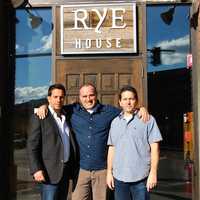 <p>The owners of Rye House Port Chester stand in front of the newly-opened restaurant.</p>