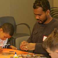 <p>Marc Rowe, 7, of the Bronx, with his uncle, Tafari O&#x27;Meally, of Yonkers.</p>
