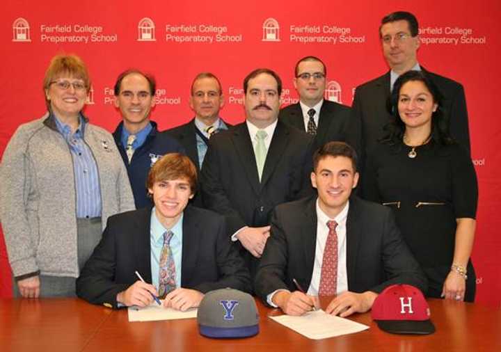 Front, left to right, are Simon Whiteman and Kevin Stone. Back row from left: Marian Whiteman, Jamie Whiteman, Principal Dr. Robert Perrotta, Varsity Baseball Coach/Teacher Rudy Mauritz, Asst. AD James Turiano, Kevin Stone and Christine Stone.