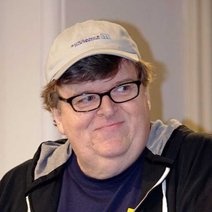 In a speech Friday, filmmaker Michael Moore lambasted Sarah Lawrence College officials response to a building workers union forming on campus, according to lohud.com.