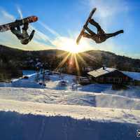 <p>Julia Marino, right, of Westport has fun with a friend during a recent ride in Canada.</p>