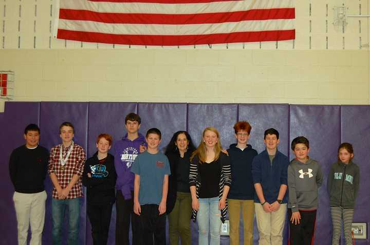 John Jay Middle Schools 10 Geography Bee participants with teacher Barbara Kessler.