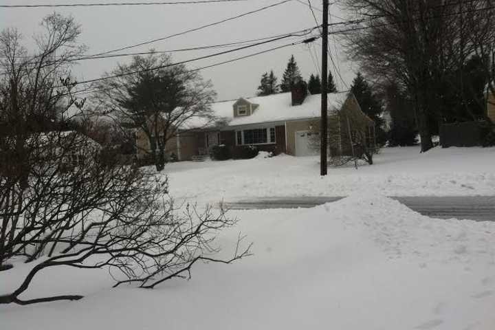 Snow Still Falling Across Stamford; Streets Remain Slick 