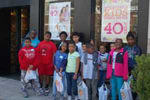 Stamford Boys & Girls Club Members Pick Out Free Shoes From Payless