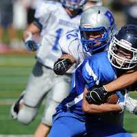 <p>Steven Ircha of Bronxville slams into a ballcarrier.</p>