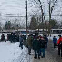 <p>Reporters crowd near the scene of the fatal collision on Wednesday morning. </p>