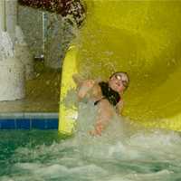 <p>A youngster makes a quick trip down a slide at the Splash Zone at Chelsea Piers Connecticut in Stamford. </p>