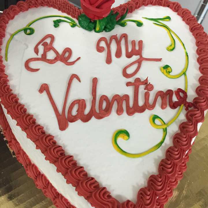 A customized cake is one way to show your love.