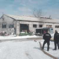 <p>Firefighters on Tuesday afternoon  battled a blaze at a storage building near North Salem Road in Southeast on Tuesday.</p>