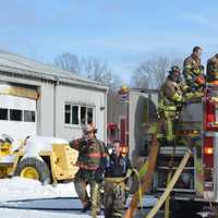 <p>Firefighters at the scene of a farm&#x27;s storage building in Southeast.</p>