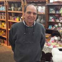 <p>Joseph Lodovico, owner of Harrison Flower Mart, is selling a dozen roses at $75 this week.</p>