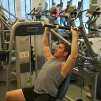 <p>A patron pushes the limits at the fitness center. </p>