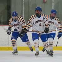 <p>The Indians celebrate after scoring a goal.</p>