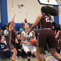 <p>Westlake&#x27;s Katie Cullen looks for shot between Valhalla&#x27;s Sofia Mazza (5) and Sam Morillo (23).</p>