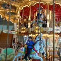 <p>Children of all ages enjoy the carousel.</p>