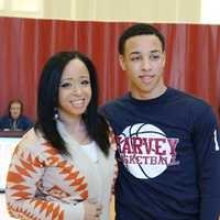 <p>Ricky Hicks of Yonkers stands with with his mother, Cinthya Pages, after scoring his 1,000th career point for Harvey School.</p>