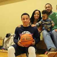 <p>Ricky Hicks with mother Cinthya Pages, his friend, mentor and trainer Robert Man Richardson, &quot;Coach Man&quot; and his son, Tre and his wife, Iyanna.
</p>