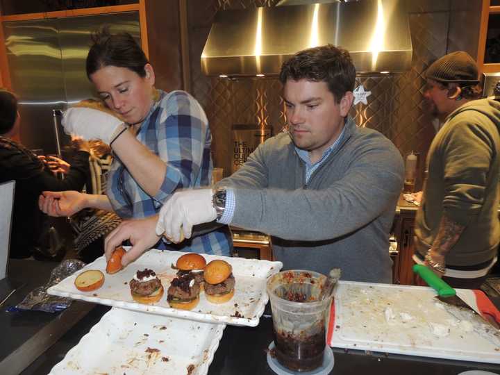 Chef and staff from The Little Pub of Wilton whipping up gourmet burgers