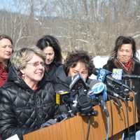 <p>Chappaqua Schools Superintendent Lyn McKay speaks at a train-crossing safety press conference in Chappaqua. She said that hundreds of students cross the track each day.</p>