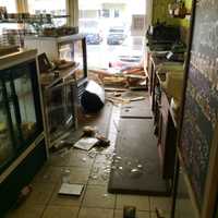 <p>The interior of the 109 Cheese &amp; Wine in Ridgefield sustained damage after a car hit the building Wednesday. </p>