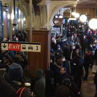 <p>Crowds gather at the Harlem 125th Station after at least two trains became disabled in the area. </p>