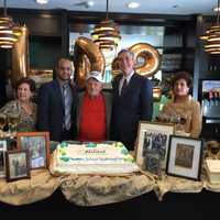 <p>Benjamin Vinokur with White Plains Mayor Thomas Roach, his two daughters and Faraz Kayani of The Bristal.</p>