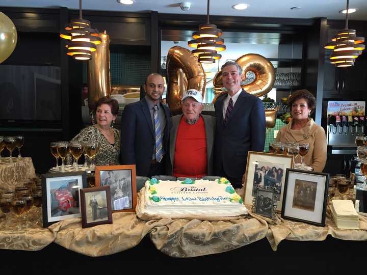 Benjamin Vinokur with White Plains Mayor Thomas Roach, his two daughters and Faraz Kayani of The Bristal.