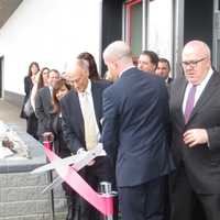 <p>Greenburgh Town Supervisor Paul Feiner, left, with executives from Saks and Hudson&#x27;s Bay Company during a ribbon-cutting ceremony on Wednesday.</p>