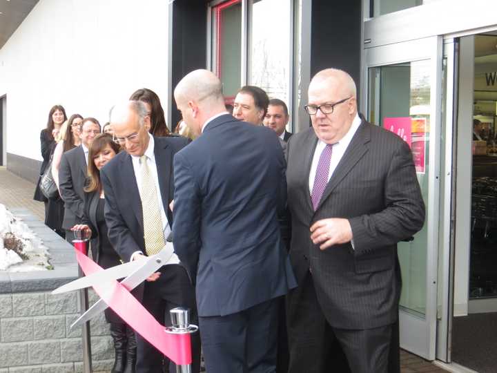 Greenburgh Town Supervisor Paul Feiner, left, with executives from Saks and Hudson&#x27;s Bay Company during a ribbon-cutting ceremony on Wednesday.