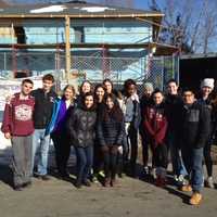 <p>Members of the Harrison High School Youth Volunteers of Harrison (YVH) Club participated in the building of a house by Habitat for Humanity in Yonkers. </p>