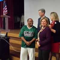 <p>From left, rapper James McBride, White Plains Mayor Tom Roach, Ellen Lynch and Joy Feldman during an assembly at Mamaroneck Avenue Elementary School.</p>