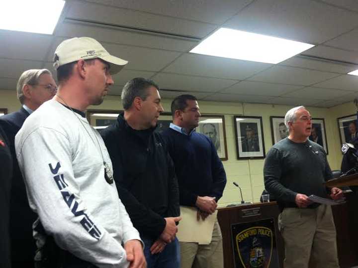 Capt. Richard Conklin speaks during the press conference announcing the arrest of a 22-year-old New Haven man and a 15-year old Stamford teen in the stabbing murder of a 52-year-old city last week.