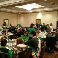 <p>Parade participants dig in at the St. Patrick&#x27;s Day breakfast Tuesday at the Bridgeport Holiday Inn. </p>