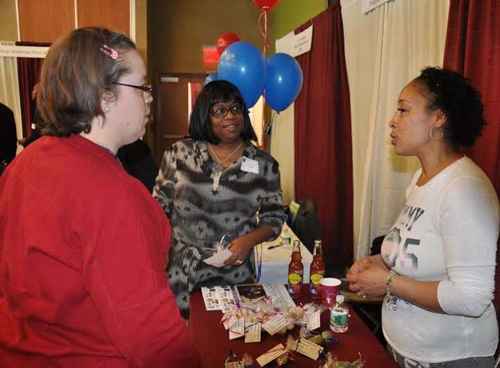 Angela Capinera of Stratford (left), Irma Evans of Bridgeport (center) and Shonda Hunter of Zanni Ani Organics (right) at the Business Expo &amp; Multicultural Marketplace held recently at Housatonic Community College. 