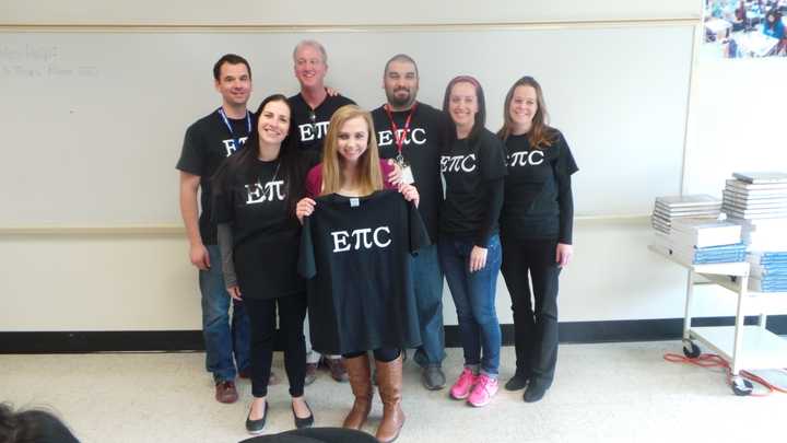 Left to right: front row-Terez Mekuto (math teacher), Christina Gregis (senior and winner of the Digits of Pi contest), and back row-math teachers Matt Murphy, Larry Carr, Jason Jaconetti, Michelle Leone and Allyson Polotaye.