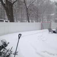 <p>The walkway is covered and the shovel is ready at this Danbury home on Friday afternoon as the snow piles up again. </p>