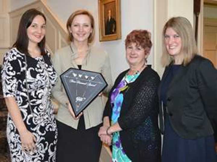 From left, Jackie Kosiba, Delamars sales director; Mariya Sytnyk, Delamars property manager; AAAs Fran Mayko, who hosted the event; and Rachael Grabiec, Delamars front office manager.