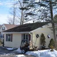 <p>A fire damaged a house that overlooks Tonetta Lake in Southeast.</p>