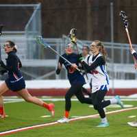 <p>Maria Gura (10), of Carmel, is surrounded by Greeley defenders.</p>