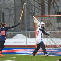 <p>Carmel keeper Tierney Day clears a ball.</p>