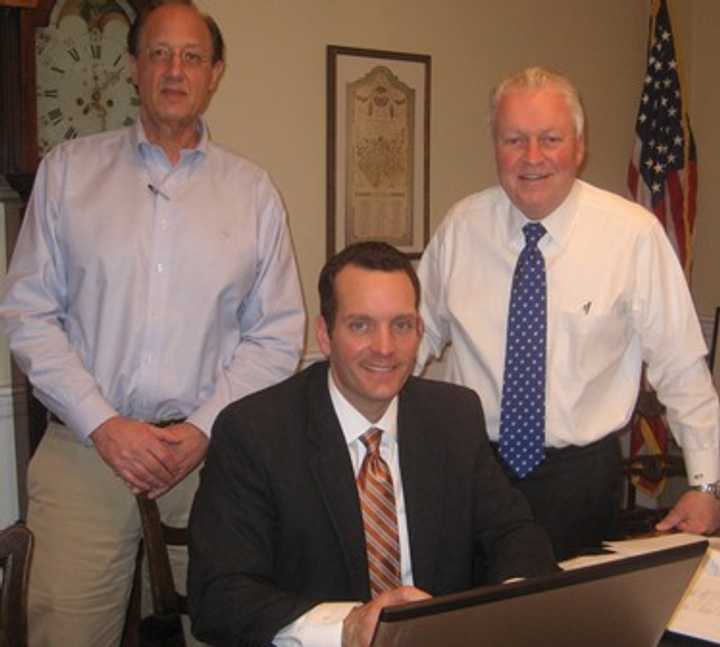 Left to right, Fairfield CFO Bob Mayer, Matthew Spoerndle, Senior Managing Director at Phoenix Advisors, the Towns Financial Advisor, and First Selectman Mike Tetreau enjoy the latest review from Moody&#x27;s.