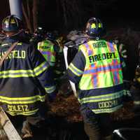 <p>Firefighters at the I-95 crash scene.</p>