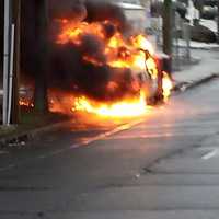 <p>The truck is fully engulfed in fire. </p>