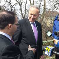 <p>Port Chester Mayor-Elect Dennis Pilla, left, speaks to U.S. Sen. Charles Schumer on the I-95 overpass along Grace Church Street on Tuesday.</p>