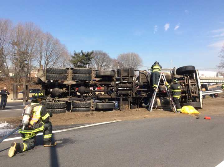 The tractor-trailer came to rest on the driver&#x27;s side. 