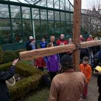 <p>Walkers stop along the route for several moments of prayer.</p>