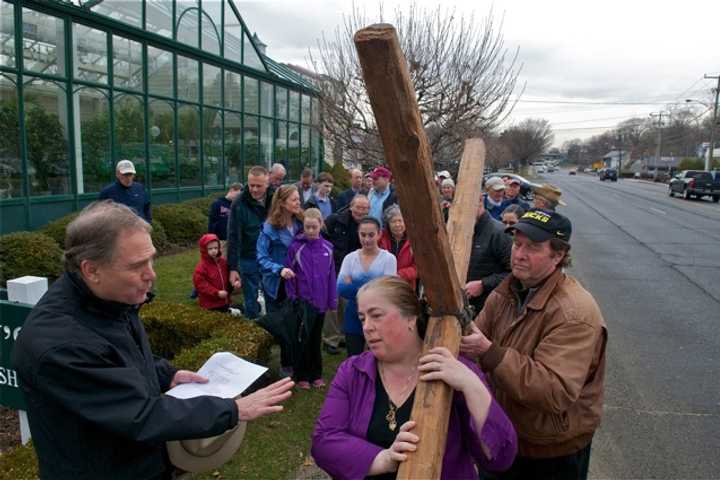 Darien's Faithful Usher In Good Friday By Carrying Cross