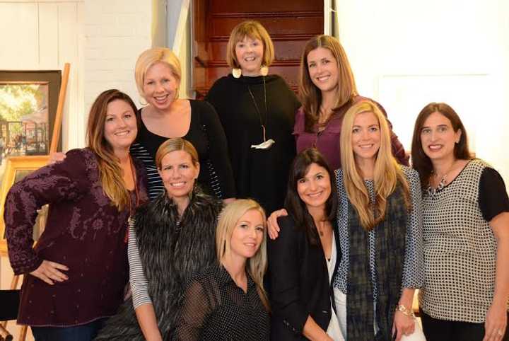 Near and Far Aid women make plans for the tour. Standing, left to right are Jessica Grutkowski, Alexis Harrison, Molly Patton and Kelly Scinto. Bottom, from left, are Carol Timpanelli. Beth Emmott, Christine Enea, Jen Agne and Vanessa Dembrowksi. 