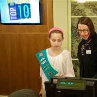 <p>Girl Scout Annelise Bentley learns about working at the museum, with Director of Education Christine Jewell.</p>